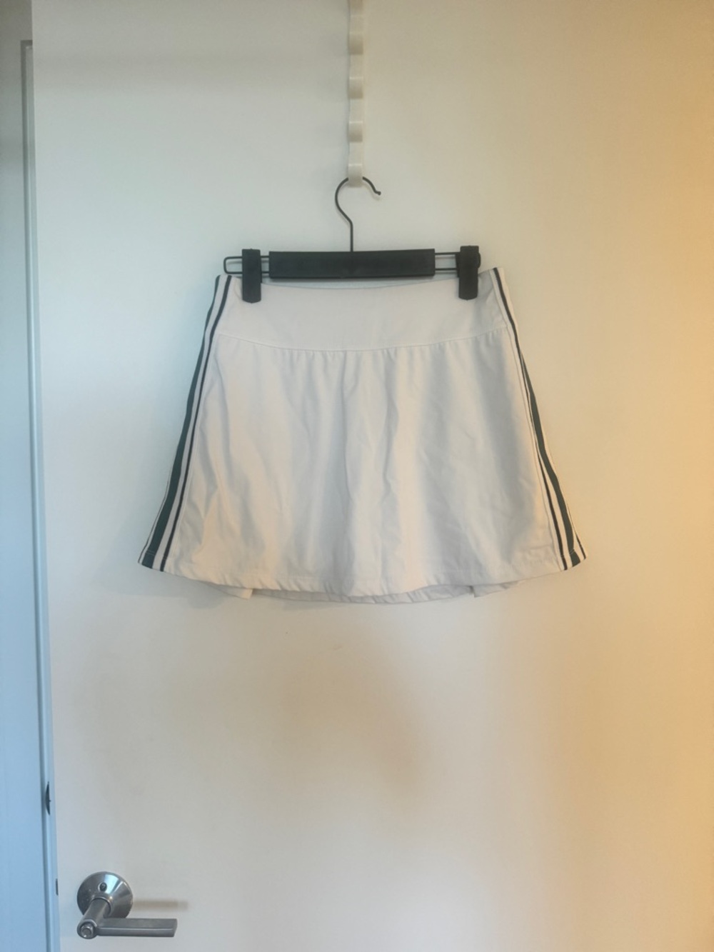 Alala White Tennis Skort with Black Side Stripe